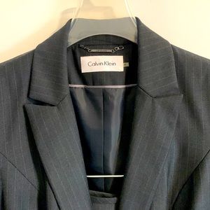 Calvin Klein, Pin stripe charcoal suit with skirt, size 6, worn once